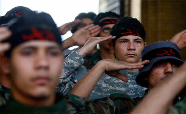 لماذا يحارب الشيعة إلى جانب النظام السوري .. لوس أنجلوس تايمز تجيب