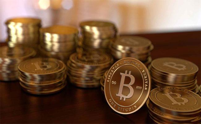 قيمة البيتكوين الواحد تجاوزت أوقية الذهب