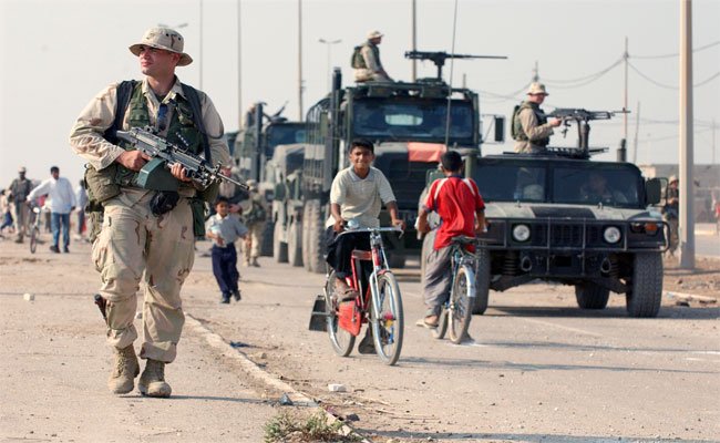 أمريكا وإيران تتسابقان على الحدود بين سوريا والعراق