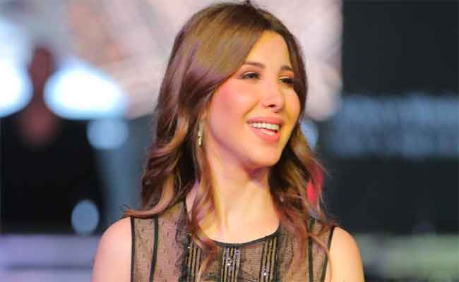 اليونيسيف تشجع الرضاعة الطبيعية بصورة لنانسي عجرم وابنتها ليا...