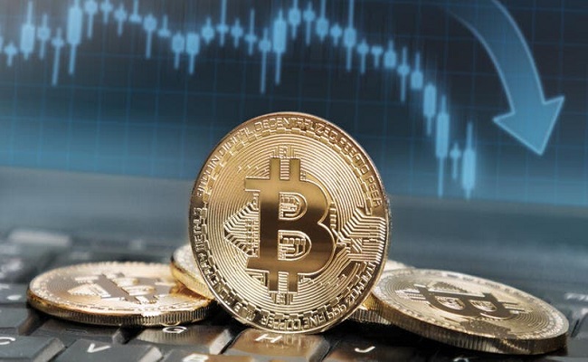 بيتكوين ينخفض إلى مستويات 49 ألف دولار...