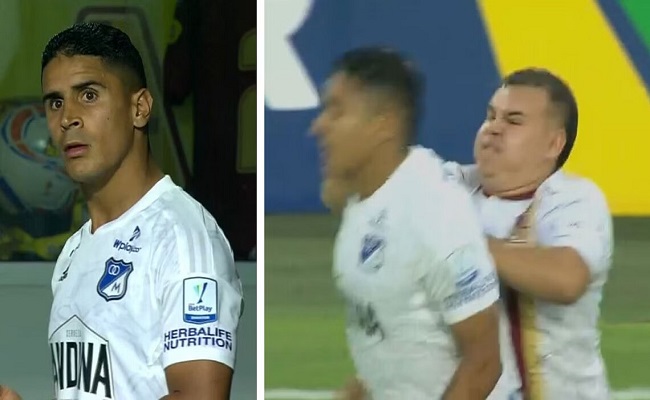 لاعب يعتدي على مشجع ضربه في الملعب والحكم يطرده...