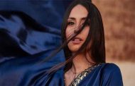 هبة طوجي تقدم تحفة فنية ملونة بطعم الحياة في 